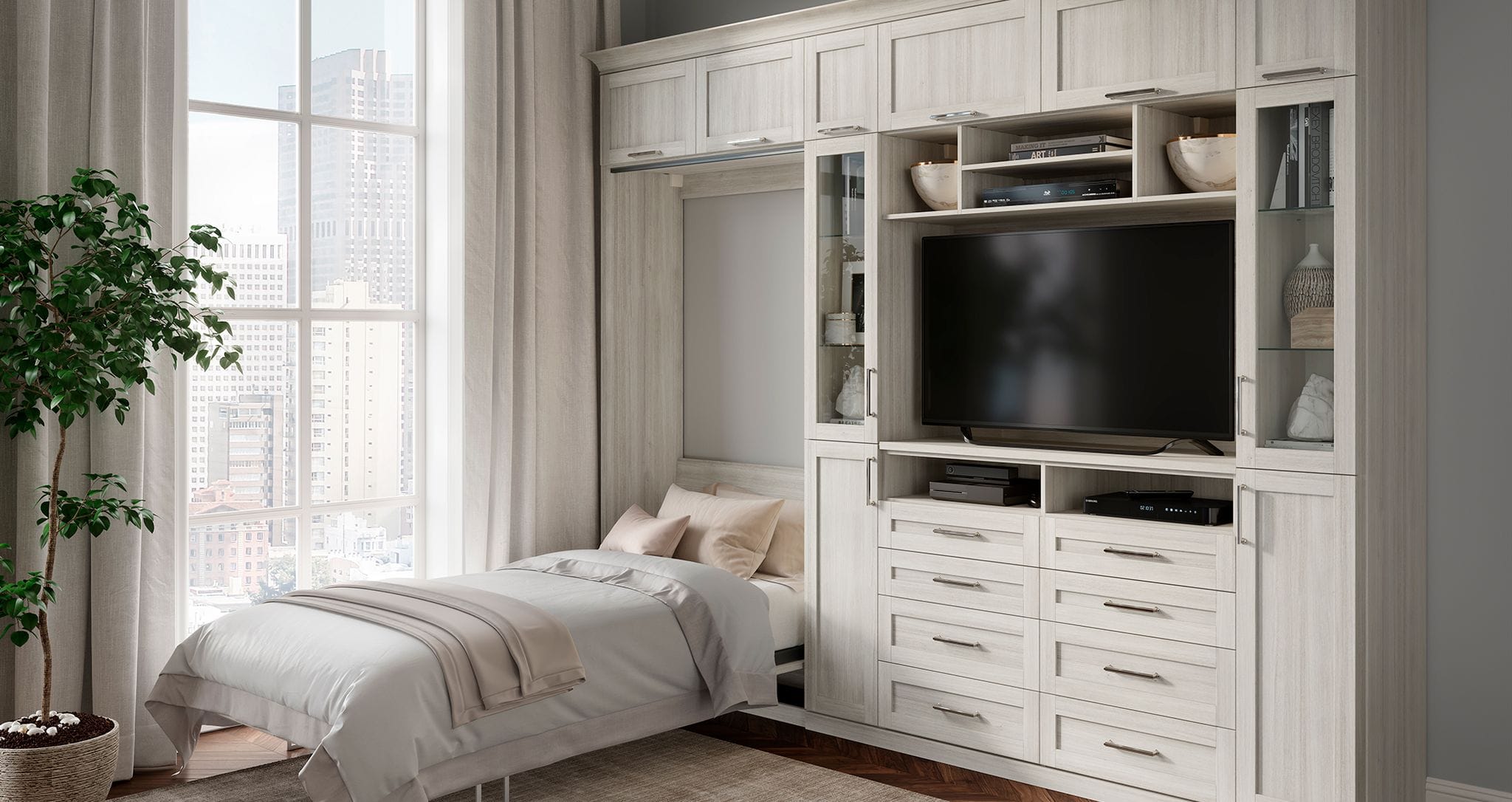 Vertical tilt Murphy bed with built in desk and shelving designed by California Closets