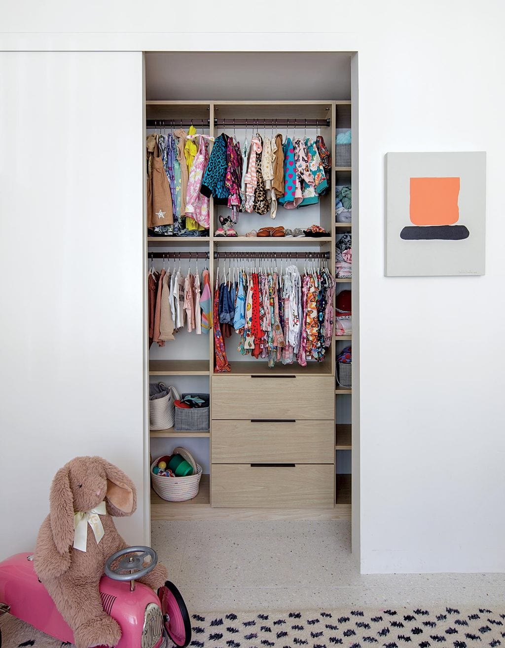Custom kids walk in closet for Matt Sorum and Ace Harper created by California Closets